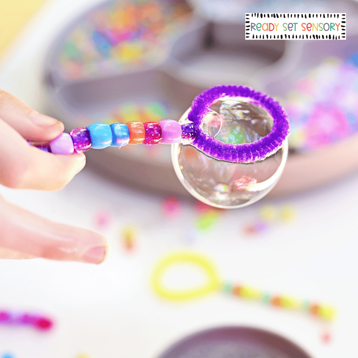 Bubble wand fine motor activity for kids using beads
