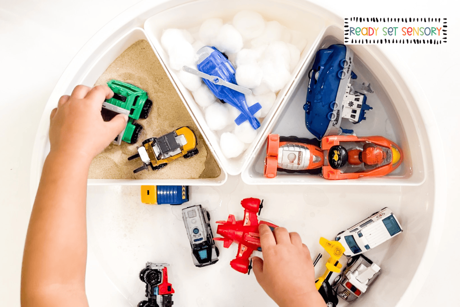 Hands-on vehicle sorting sensory activity for toddlers