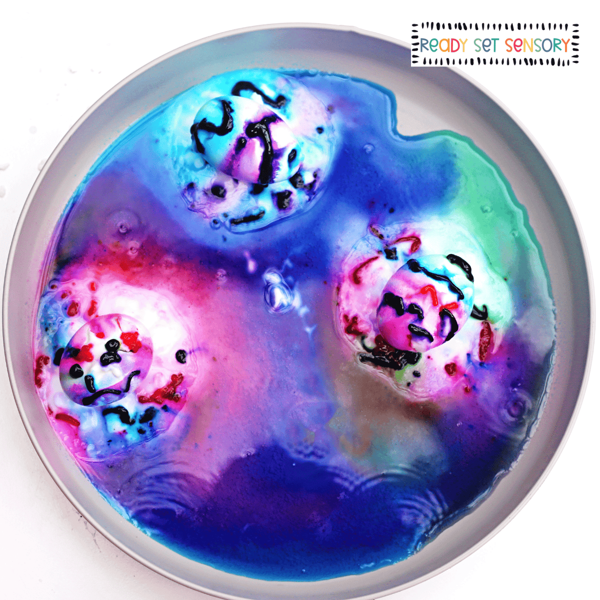 Fizzy Easter egg dye experiment with colorful bubbling reactions