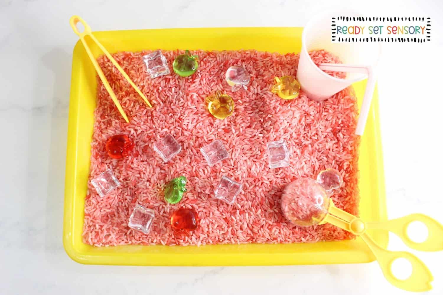 Step 4 of setting up a Fall Apple Juice Sensory Bin (Easy & Cheap!)